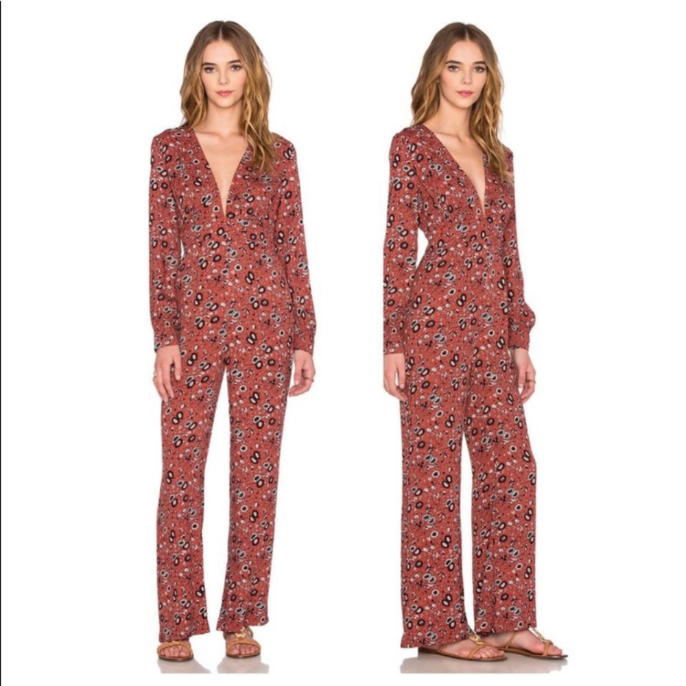 Free People•rust red/orange one piece deep V front, zip up back. EUC!! Size 0
